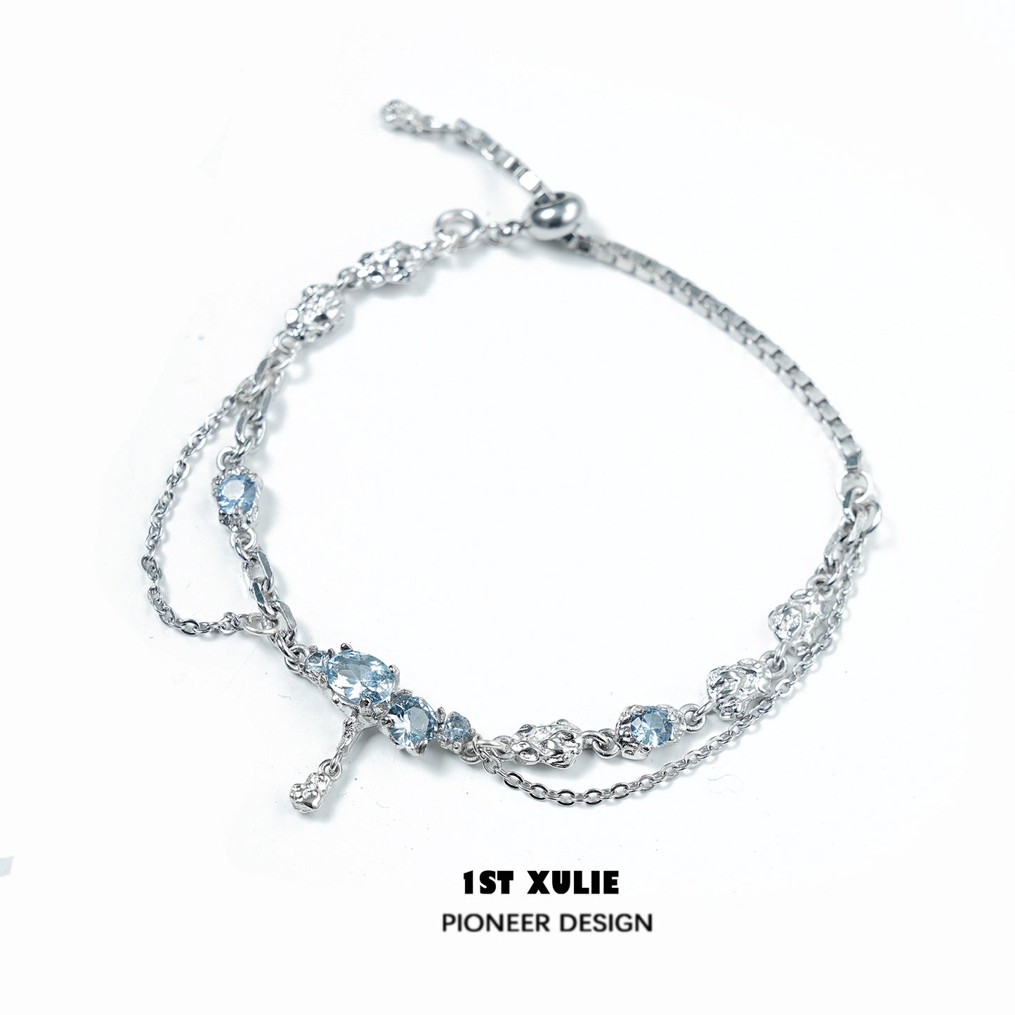 Elegant blue moonstone bracelet with silver chain, featuring multiple shimmering stones