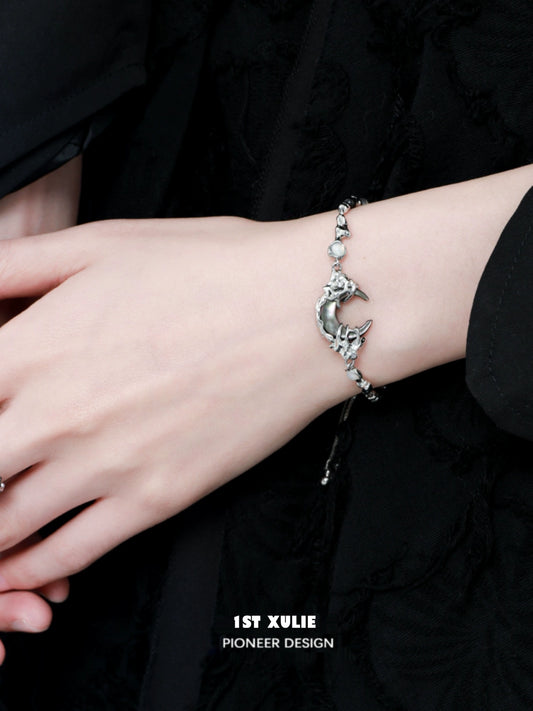 Elegant dark moon agate bracelet with crescent moon charm for a stylish accessory