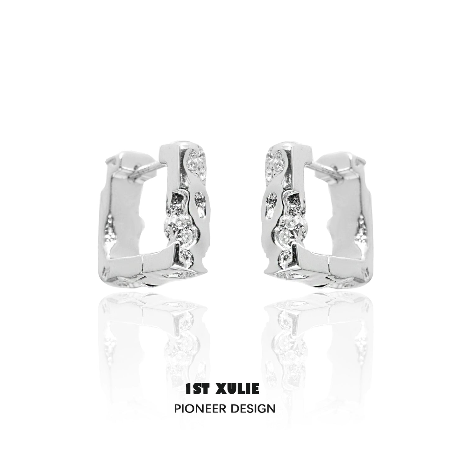 Frosted geometric earrings designed by 1STXULIE with unique cut and modern finish.