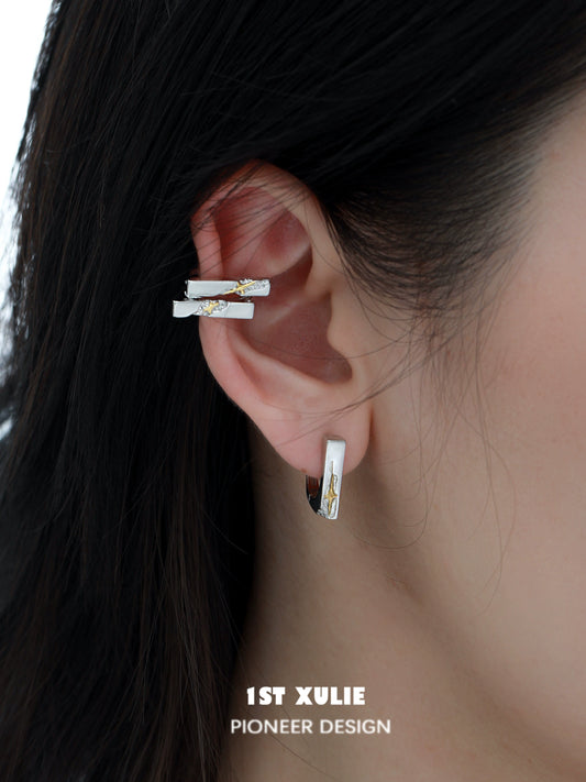 Elegant star ear cuff jewelry showcasing a unique design on the ear for modern style.