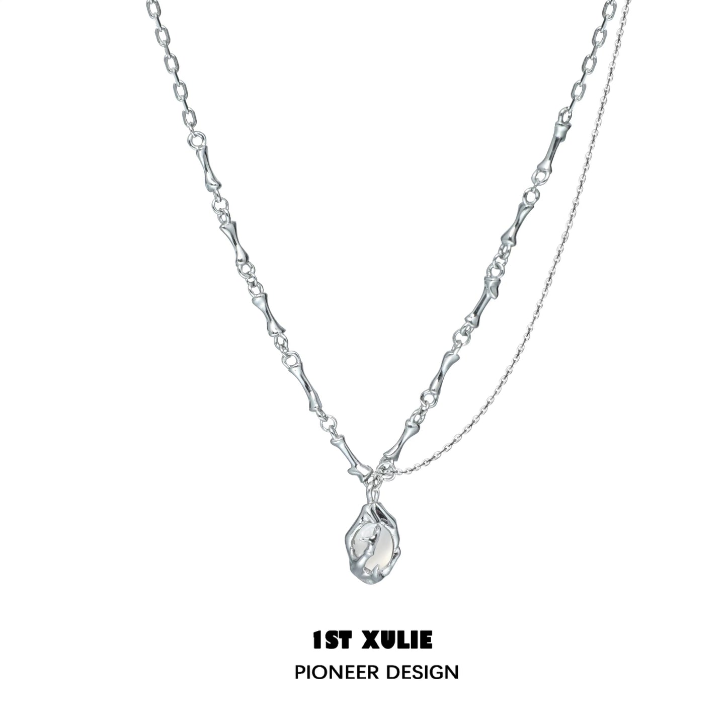 1ST XULIE unique summer pendant necklace in silver with a delicate, artistic design