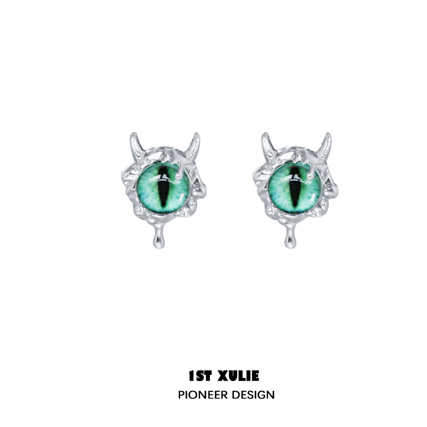 Y2K demon eye earrings in silver with green eye detail and intricate design