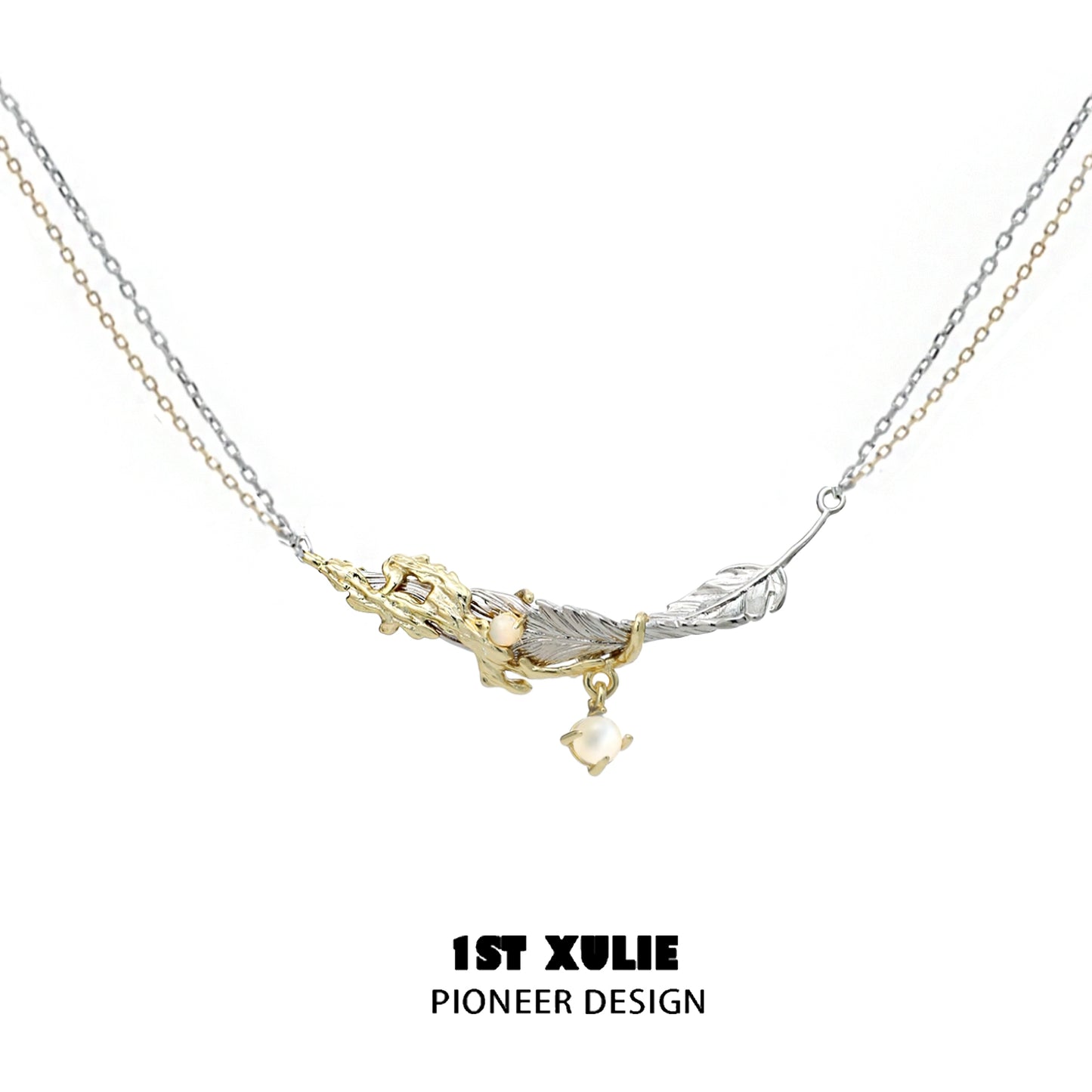 Stylish Y2K feather necklace with silver and gold chains, featuring a unique design and charm.