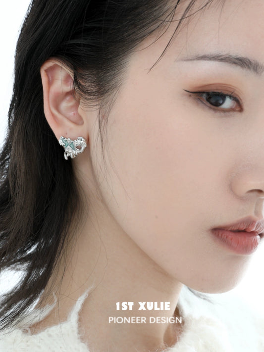 Stylish 1ST XULIE Y2K melting love earrings featuring unique heart design for modern fashion lovers