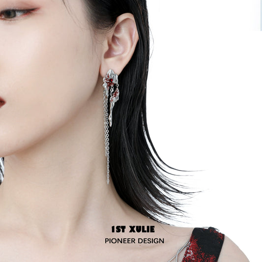 Y2K post-apocalyptic earrings featuring unique design elements and intricate details