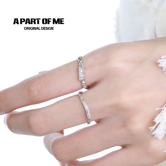 A PART OF ME minimalist lunar texture ring showcased on a hand with a delicate jewelry design