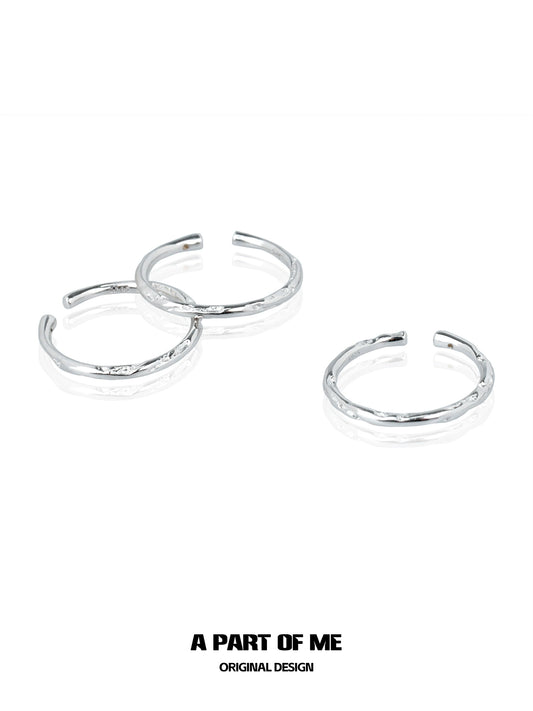 Three minimalist stack rings in silver by A PART OF ME with a sleek and modern design