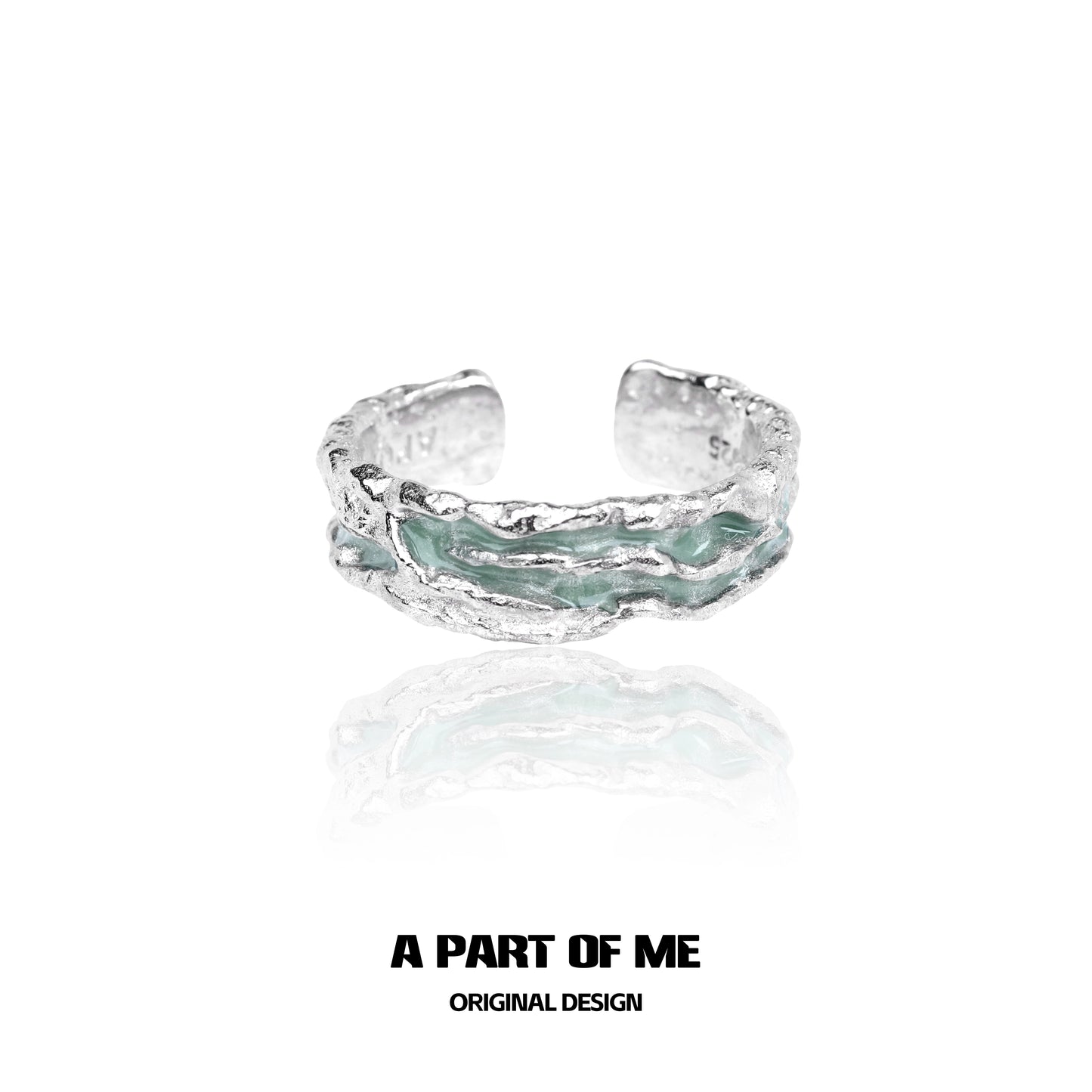 Mint silver ring by A PART OF ME featuring a textured design and unique color accents