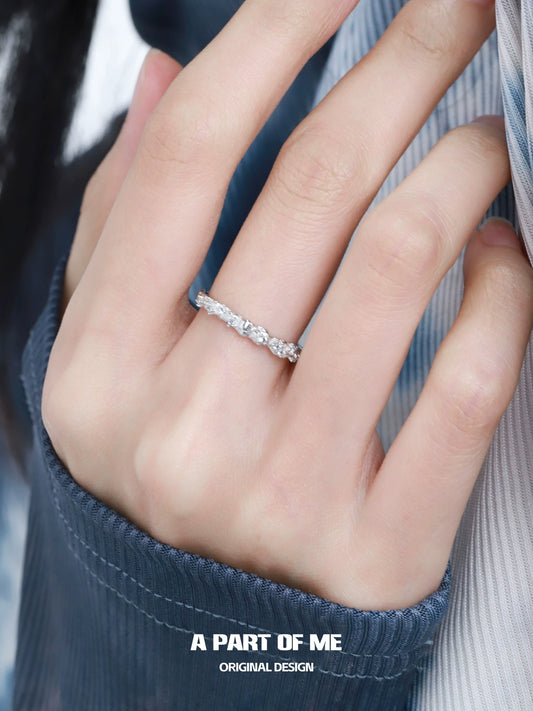 Elegant A PART OF ME blue star shard zircon ring on a hand with stylish clothing