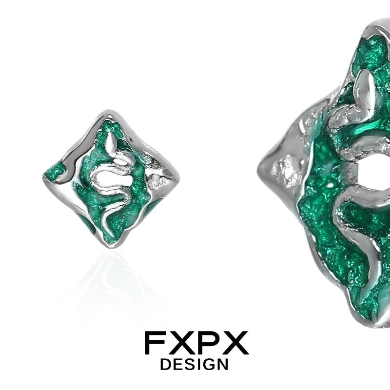 FXPX green snake earrings featuring intricate design and vibrant green color, perfect for unique fashion statement
