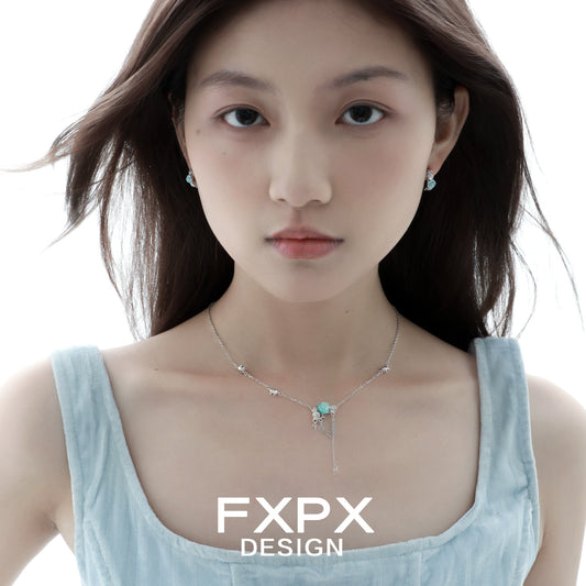 Light blue rose pendant necklace from FXPX designed for elegant style and everyday wear