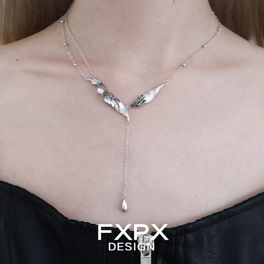 Y2K black feather necklace featuring a layered design with silver accents for a trendy look
