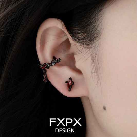 Y2K orange stud earrings designed by FXPX, featuring a unique and trendy design