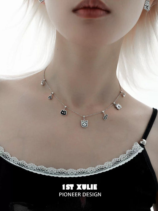 Graffiti cat sterling silver necklace with charming cat pendants on a delicate chain