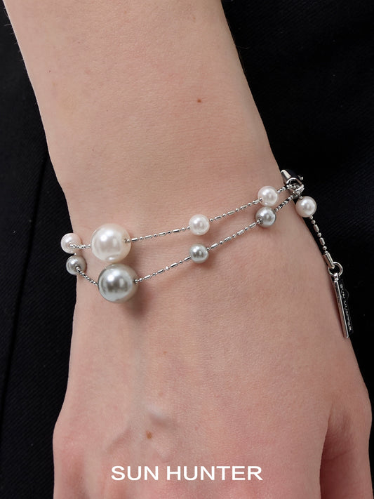 SUN HUNTER gypsy star pearl bracelet with silver chain and various sized pearls