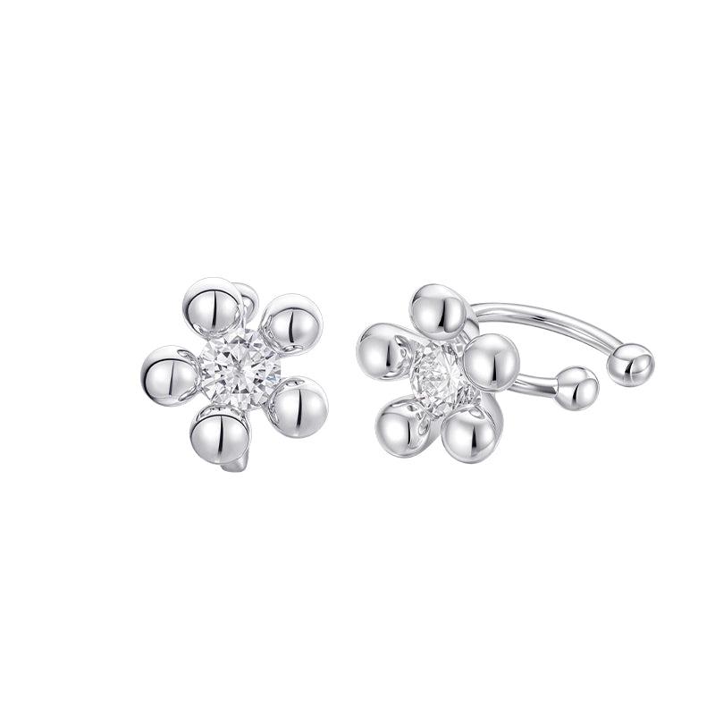 SUN HUNTER island flower silver earrings with floral design and sparkling center for elegant style