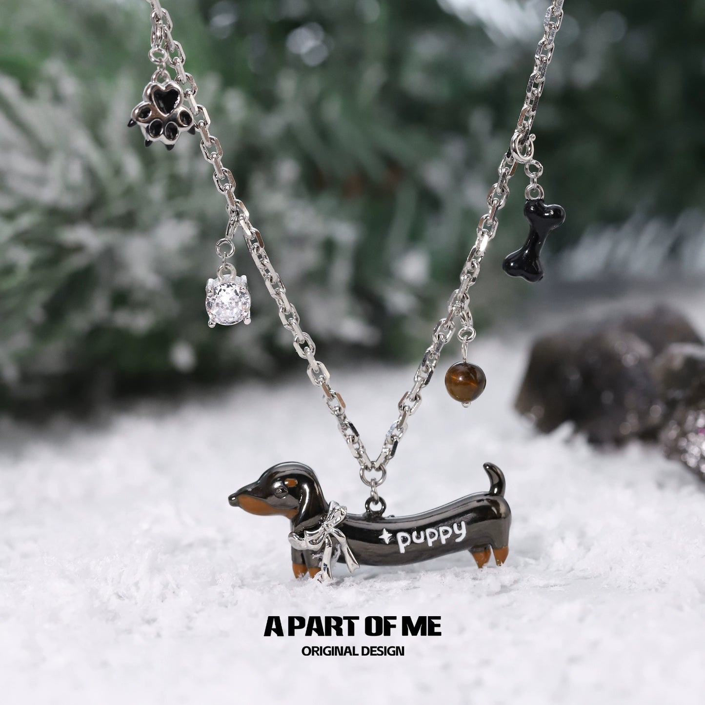 Lucky dachshund necklace by A PART OF ME featuring a cute dachshund charm and decorative embellishments