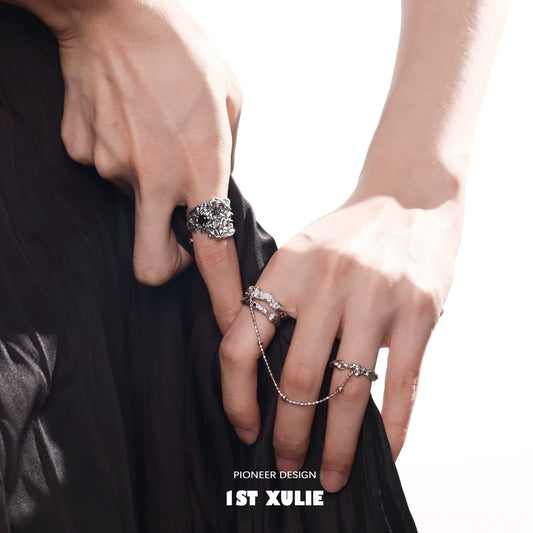 Y2K controller chain silver ring displayed on a model's hand showcasing a stylish accessories look