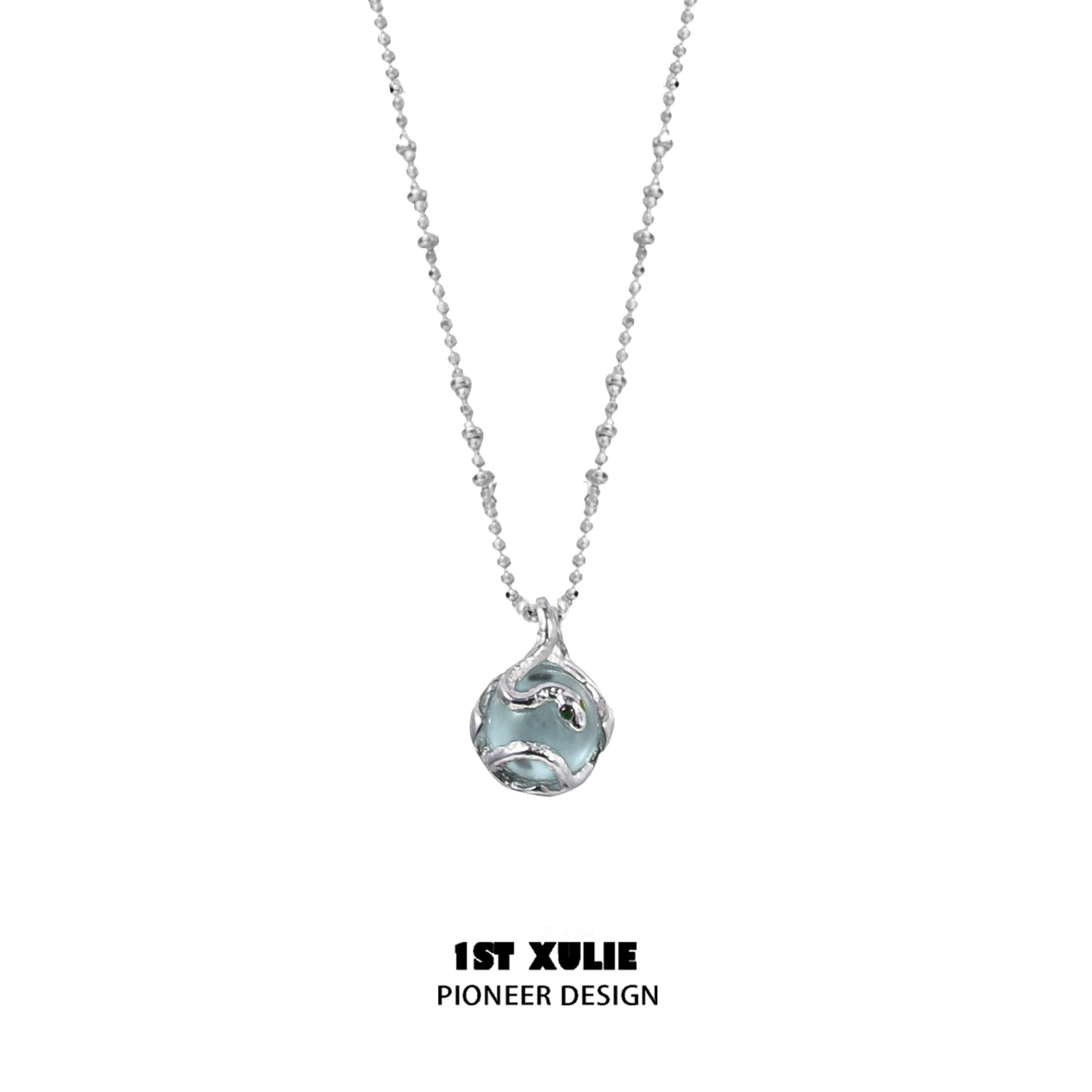 Serpent silver necklace featuring a unique design with a gemstone pendant by 1ST XULIE