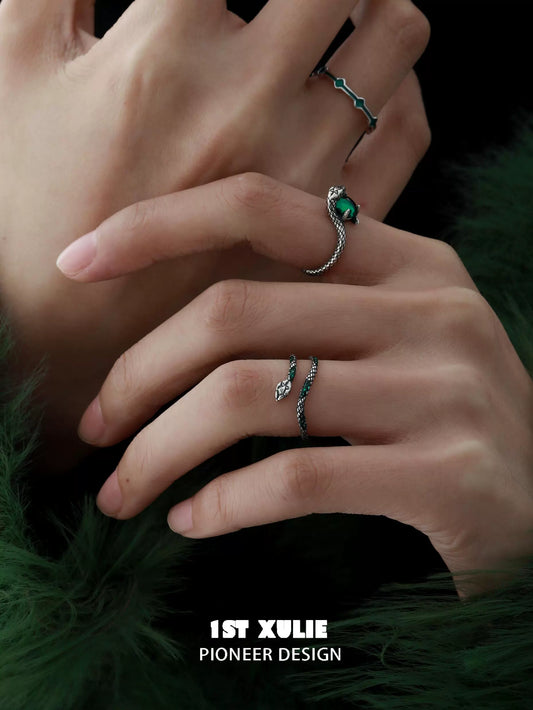 Slytherin snake couple rings designed by 1STXULIE with elegant emerald accents and intricate details