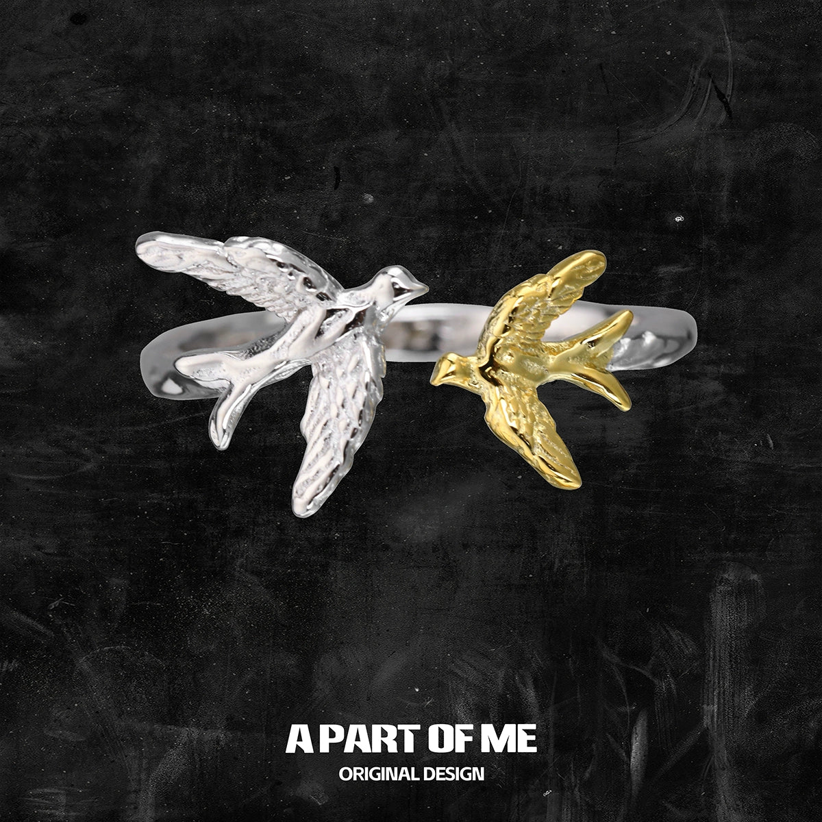 A PART OF ME soaring birds ring featuring a silver and gold bird design for unique style