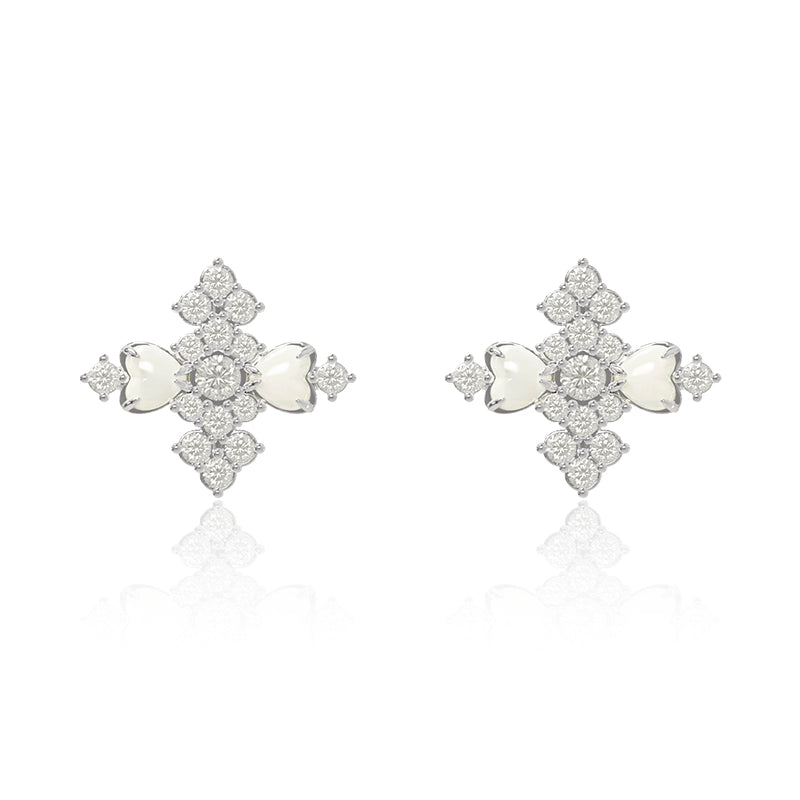Elegant vintage cross earrings with sparkling gemstones and a symmetrical design for stylish accessorizing