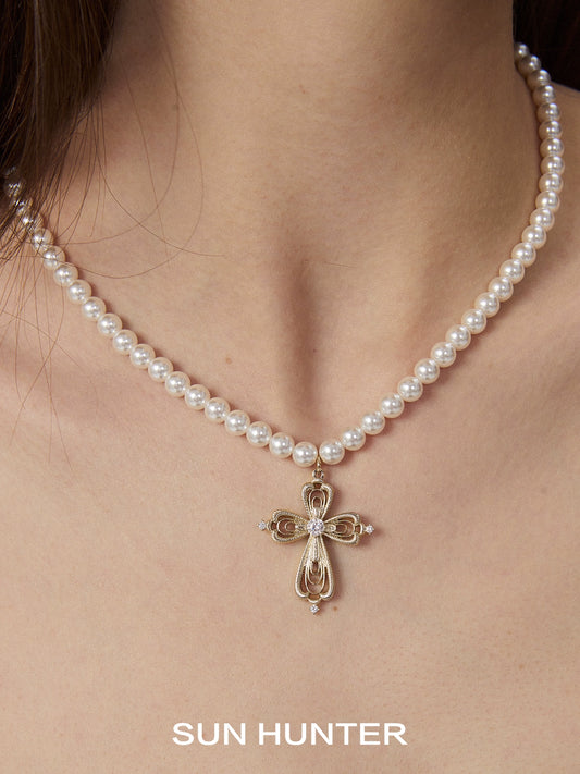 SUN HUNTER vintage cross pearl necklace with a delicate cross pendant and pearl strand