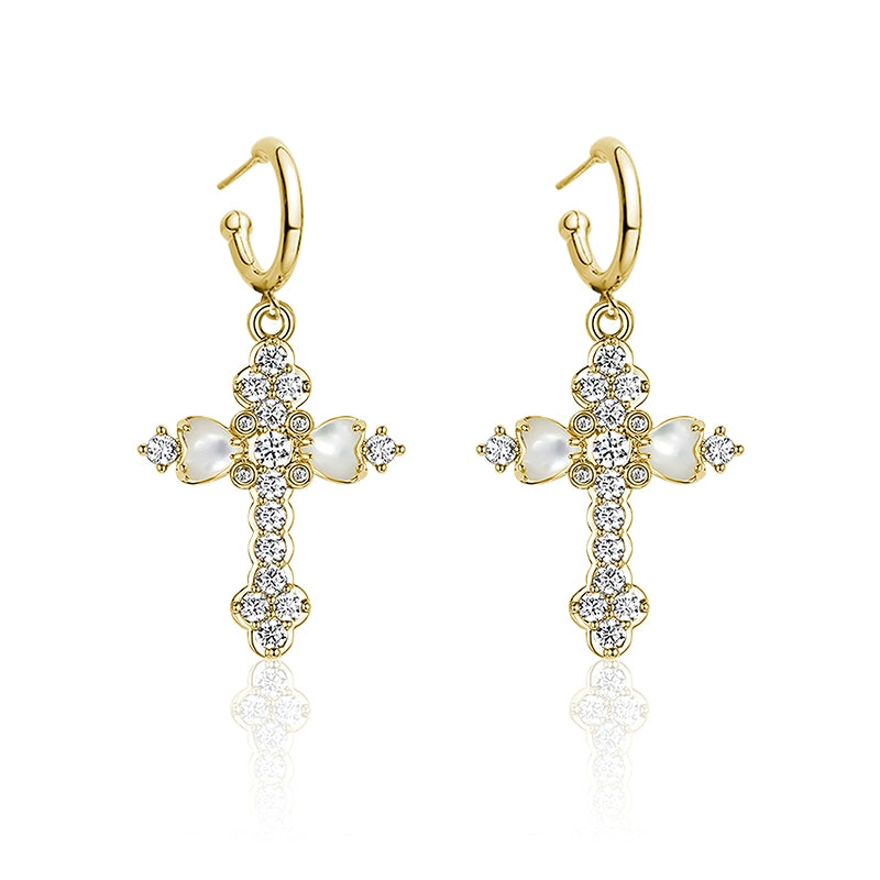 Golden vintage cross zircon earrings featuring sparkling stones and a charming design