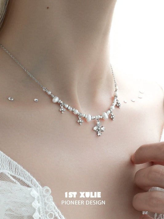 Y2K pearl necklace featuring delicate silver accents and floral designs for a trendy look