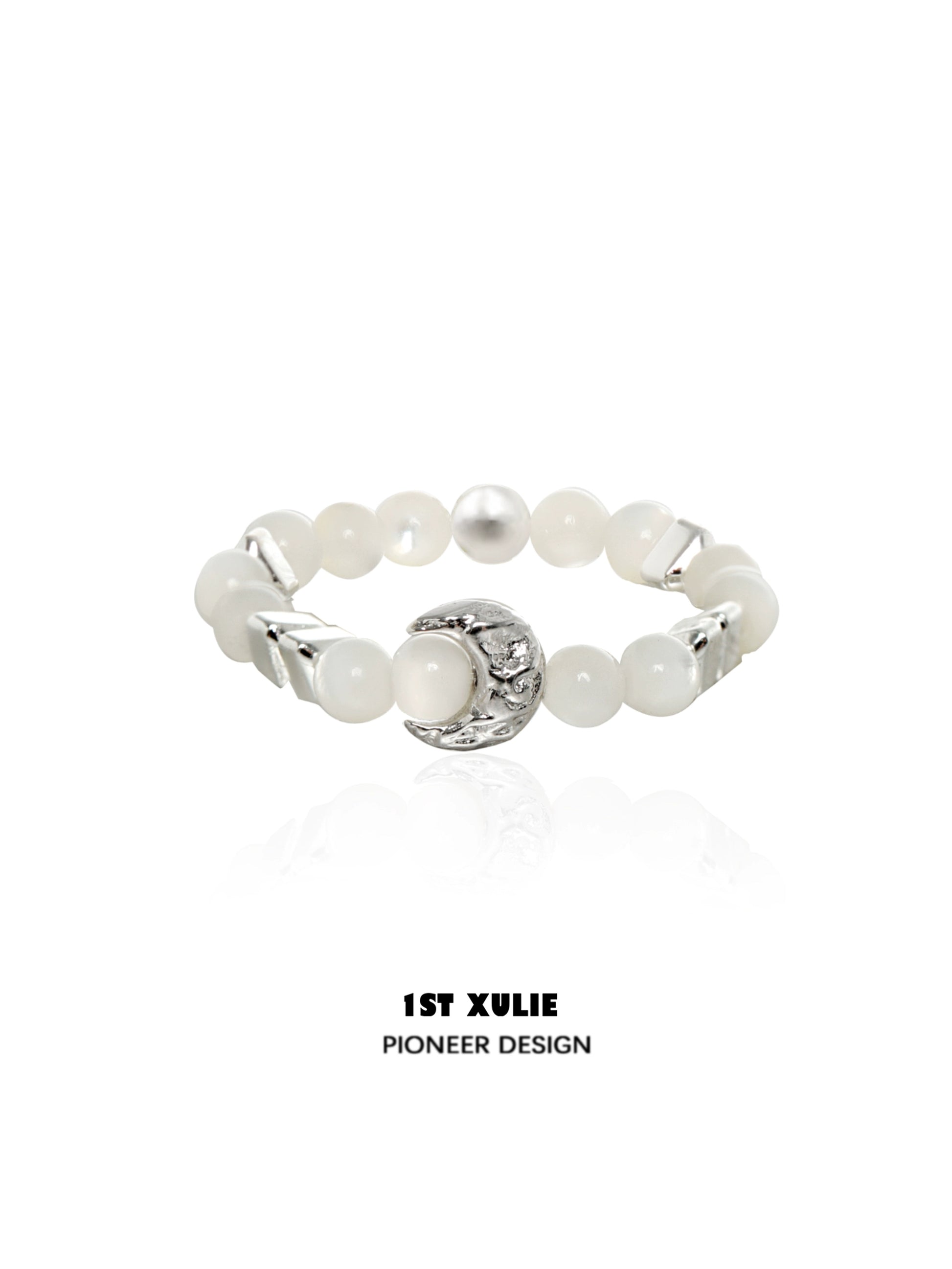 Beaded shell pearl silver ring from 1STXULIE featuring elegant design and unique texture.