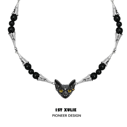 Black cat necklace featuring a decorative cat face pendant and black beads for cat lovers