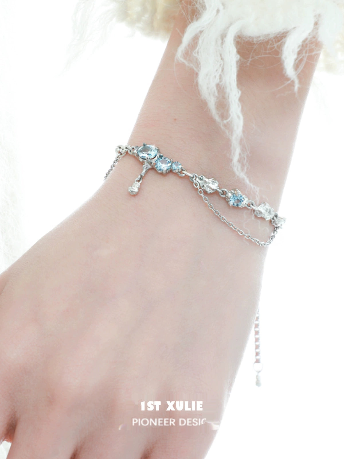 Elegant blue moonstone bracelet with silver accents, perfect for adding a touch of sophistication