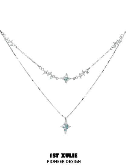 Elegant blue starry sky necklace featuring layered design with star charms and sparkling accents