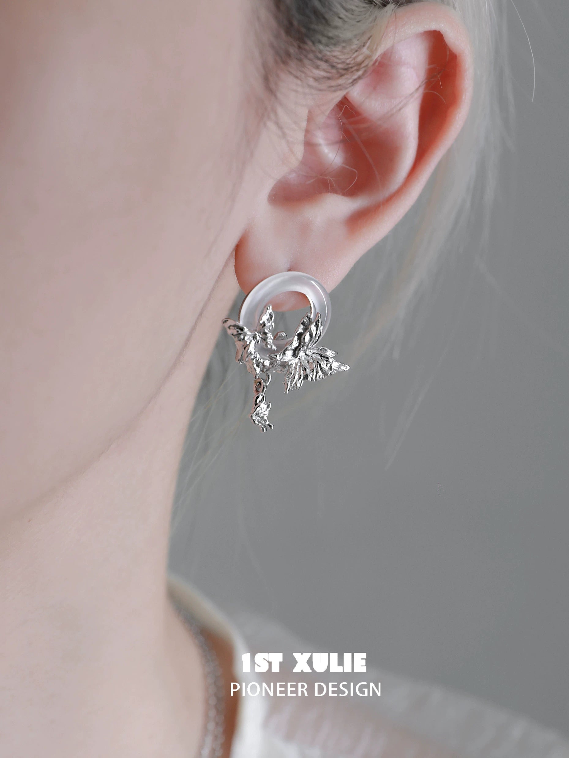 Elegant butterfly chalcedony earrings featuring a silver design for a stylish look