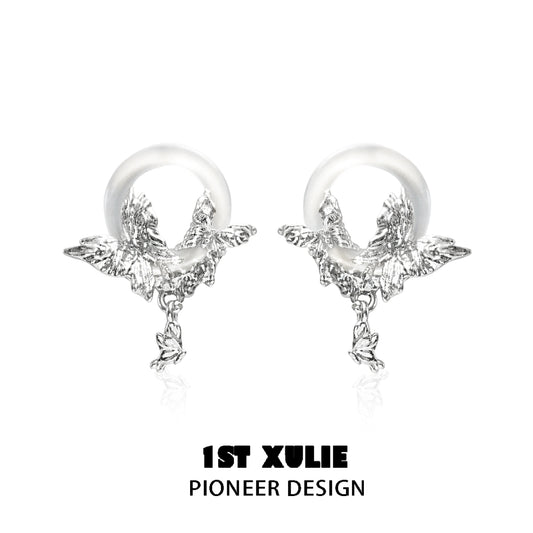 Butterfly chalcedony earrings with intricate silver design for elegant style