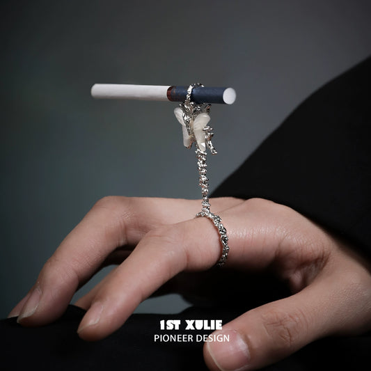 Butterfly cigarette holder ring designed by 1ST XULIE, elegantly showcasing a stylish smoking accessory