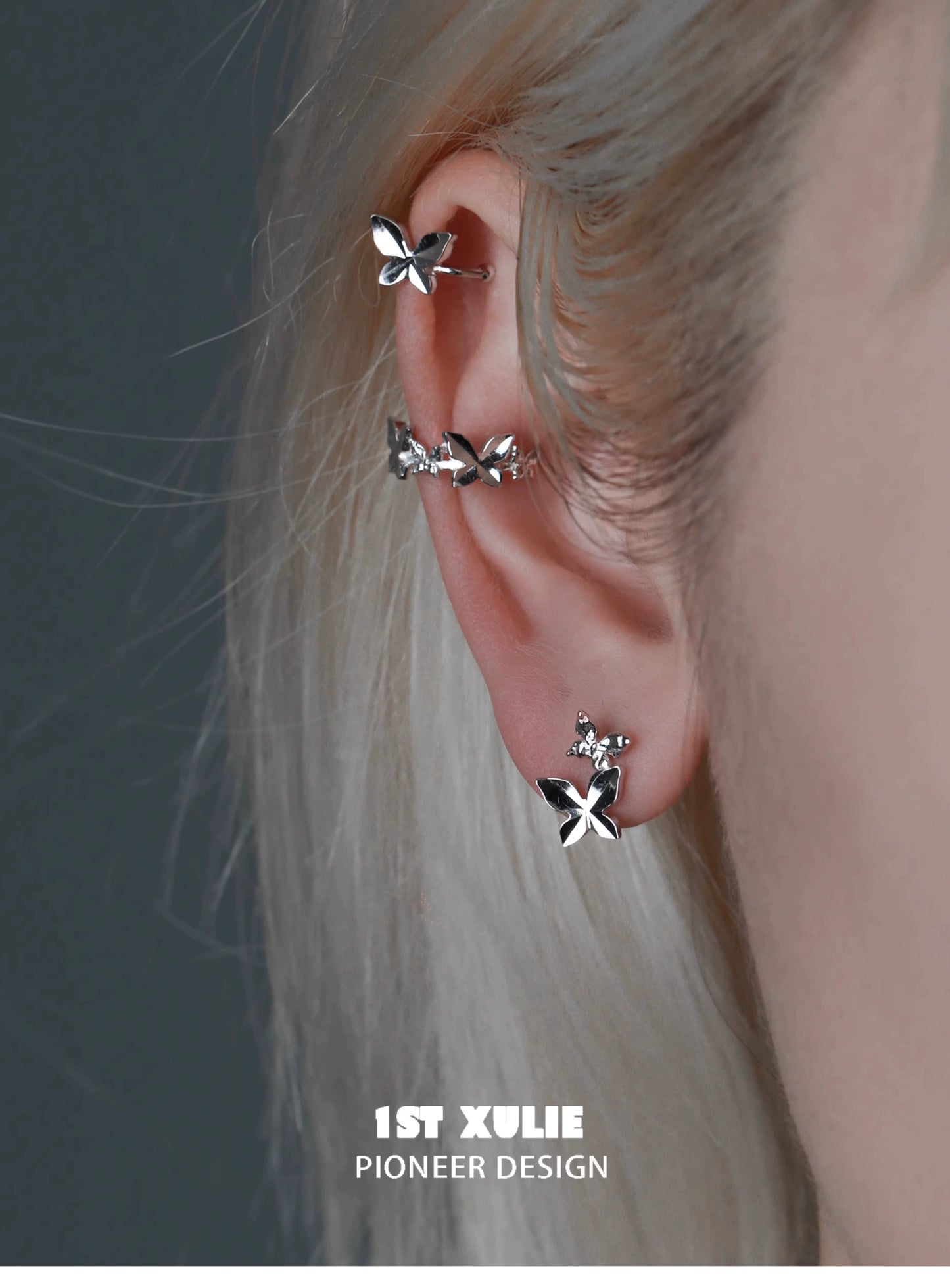 Stylish butterfly silver ear cuff featuring multiple butterfly designs for a trendy ear accessory