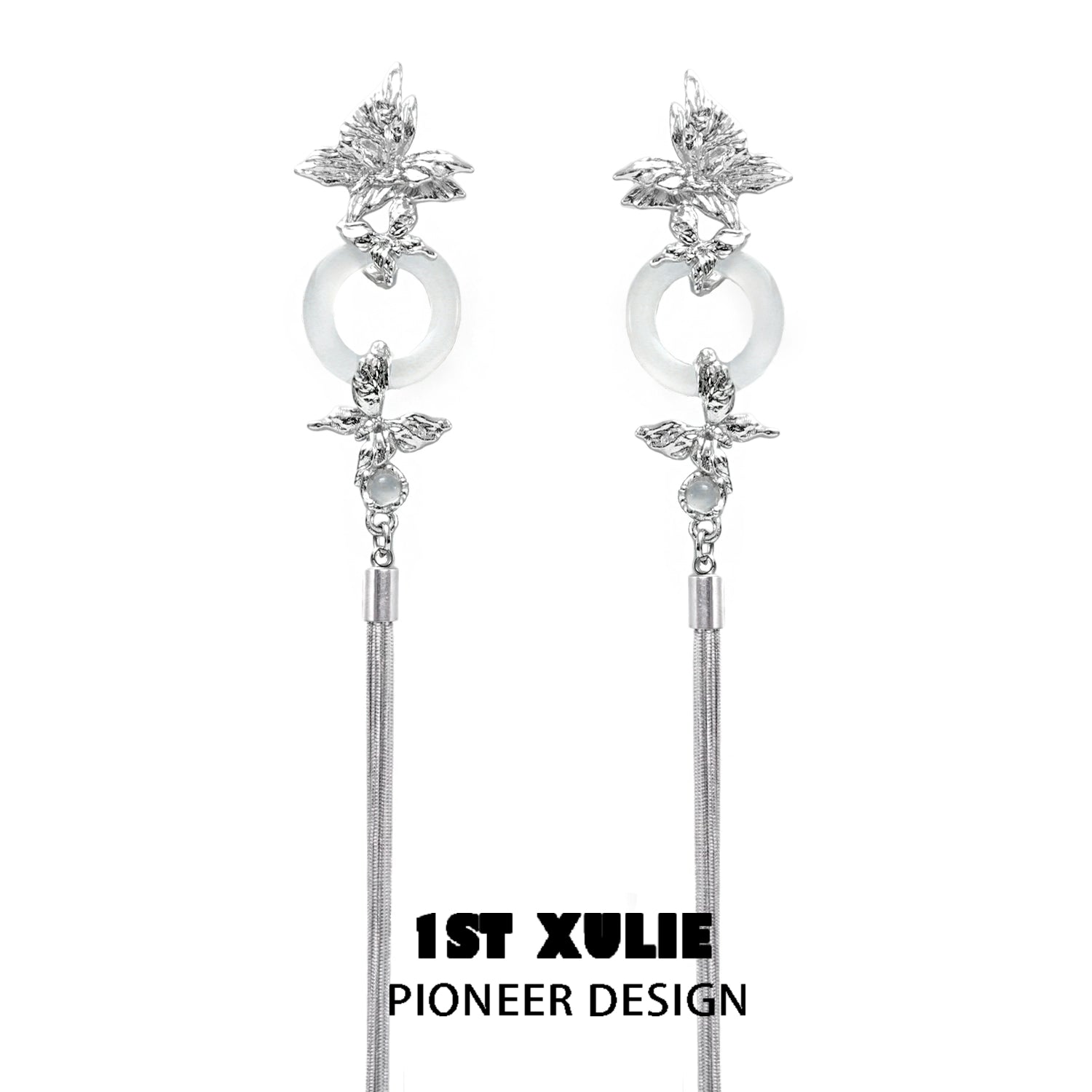 Elegant butterfly tassel earrings with silver accents and stylish design by 1ST XULIE