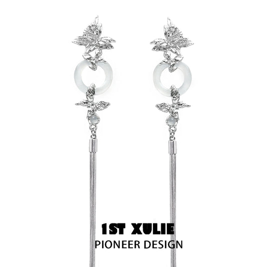Elegant butterfly tassel earrings with silver accents and stylish design by 1ST XULIE