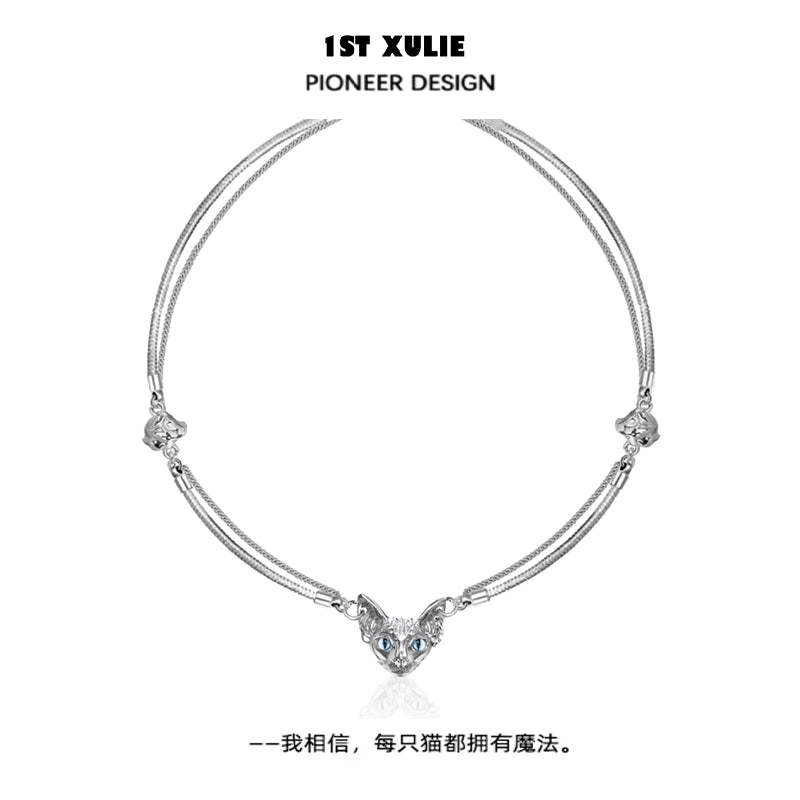 Elegant silver cat clavicle necklace featuring a sparkling cat pendant with blue eyes