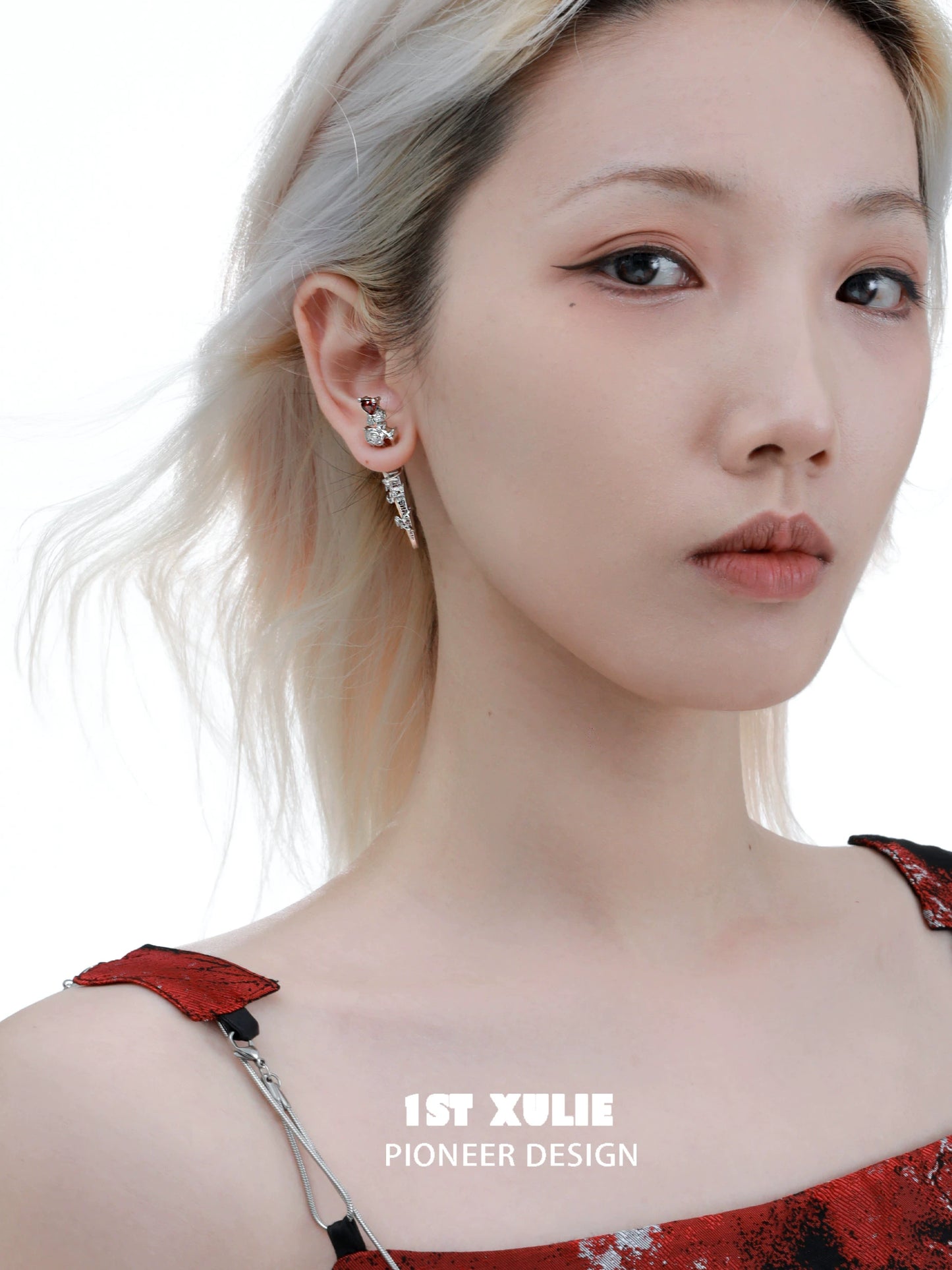 Model wearing 1ST XULIE cathedral rose piercing earrings for a stylish accessory look