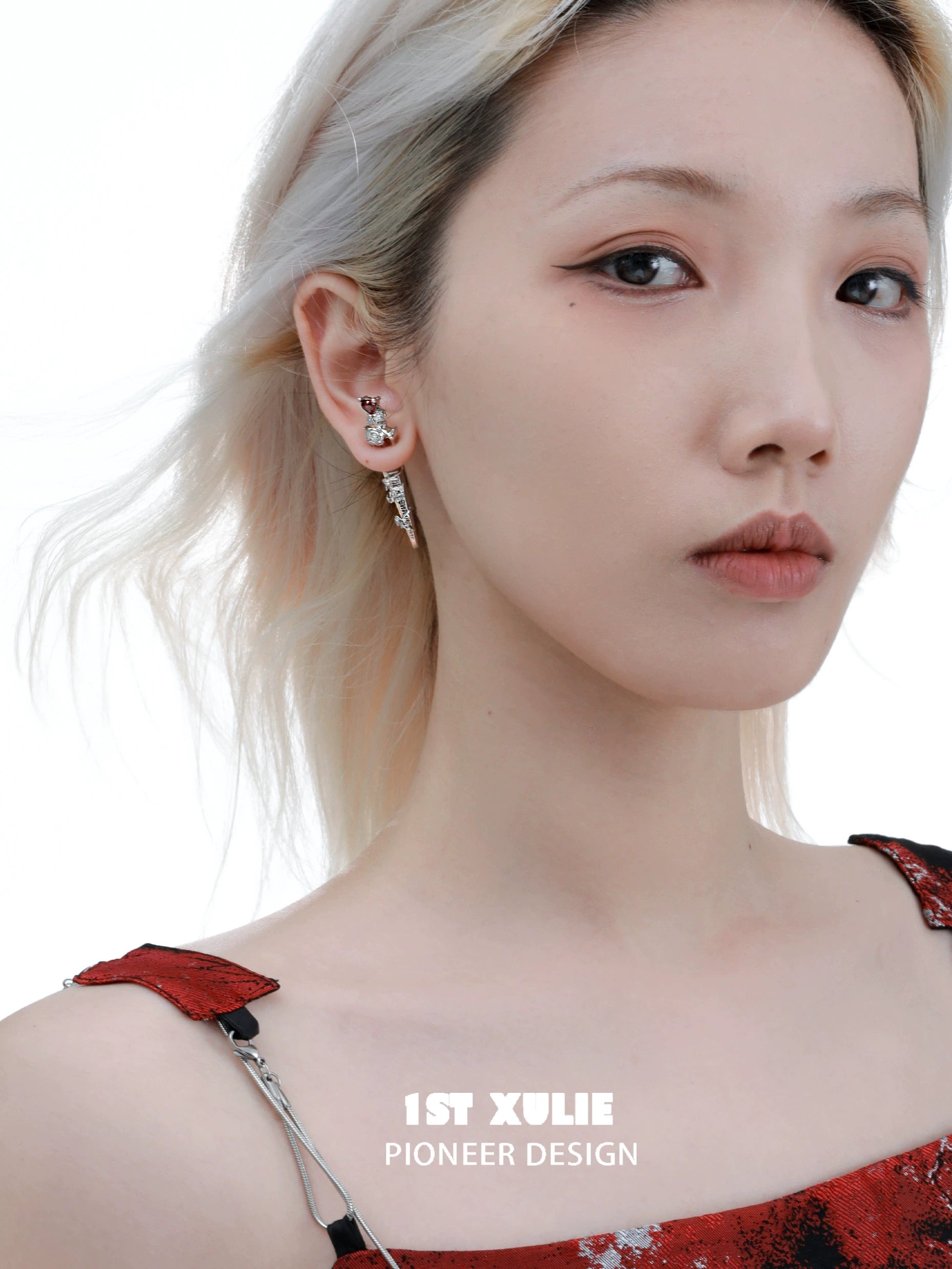 Model wearing 1ST XULIE cathedral rose piercing earrings for a stylish accessory look