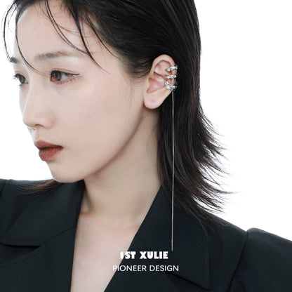 Stylish woman wearing celestial agate ear clip with sleek design and contemporary aesthetic