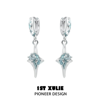 Celestial sea star earrings in silver with a unique design featuring turquoise accents