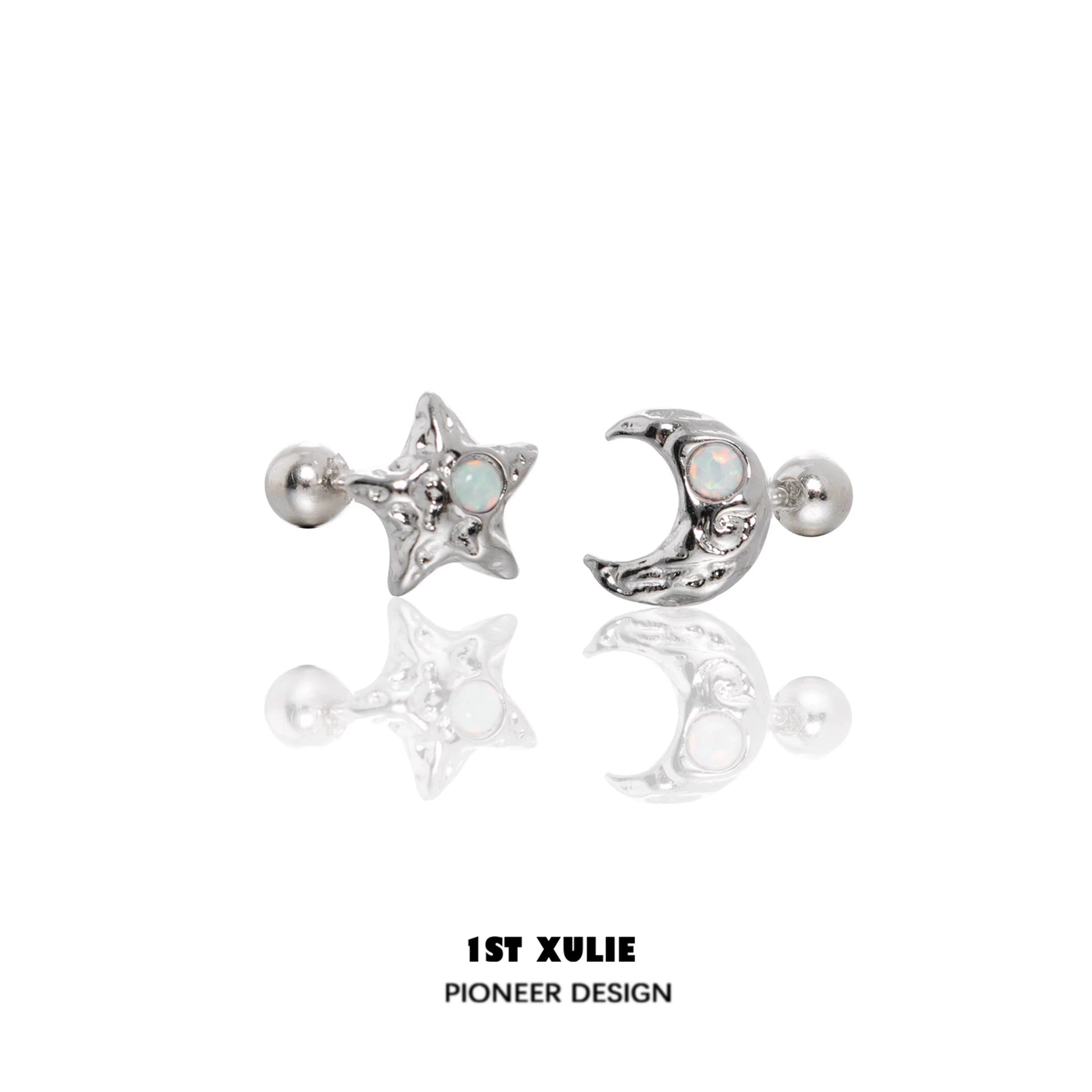 Silver cosmic moon and star earrings with opal details for a celestial-inspired look