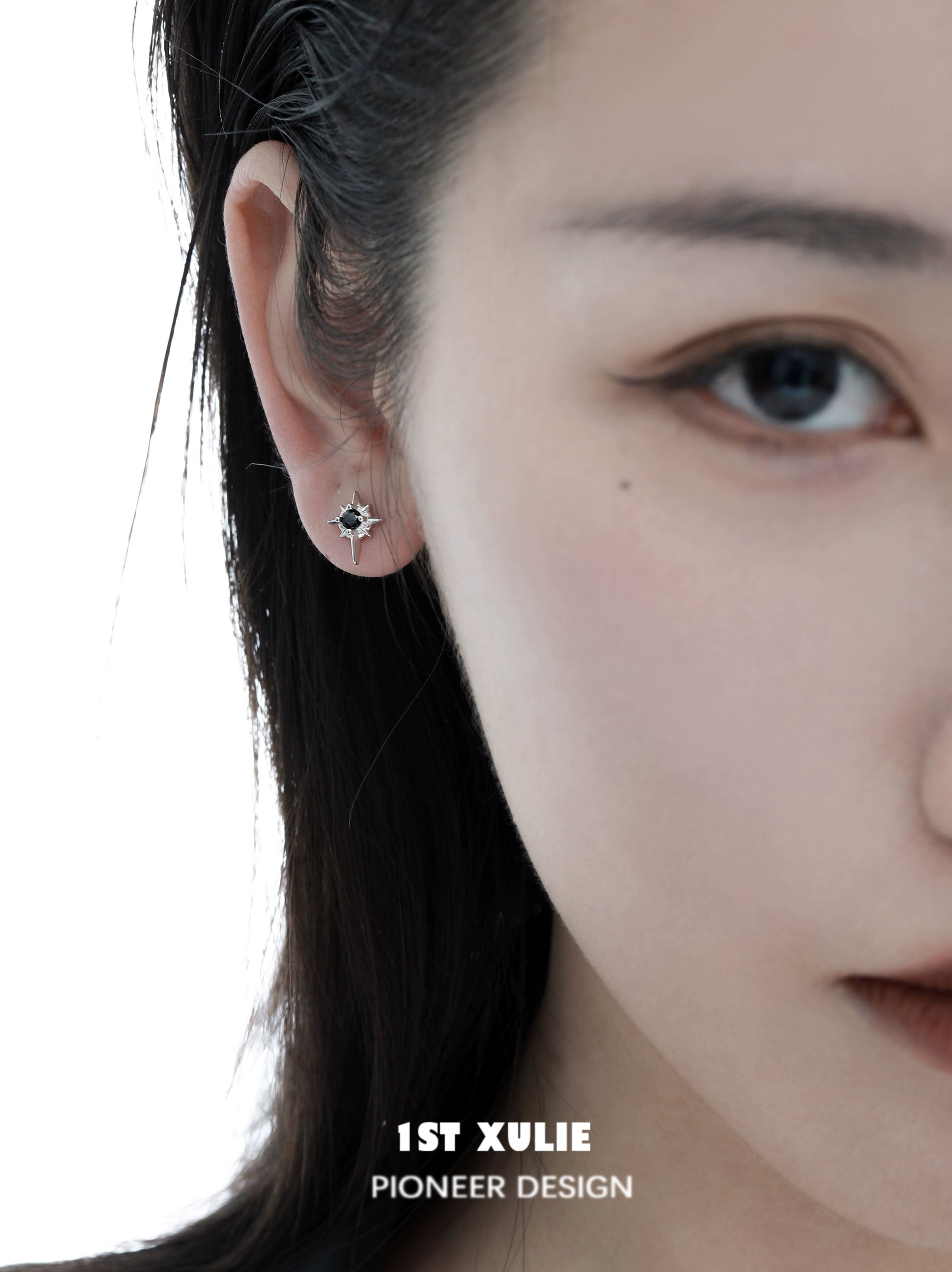 Chic model wearing 1STXULIE cosmic star earrings that add a stylish touch to any outfit