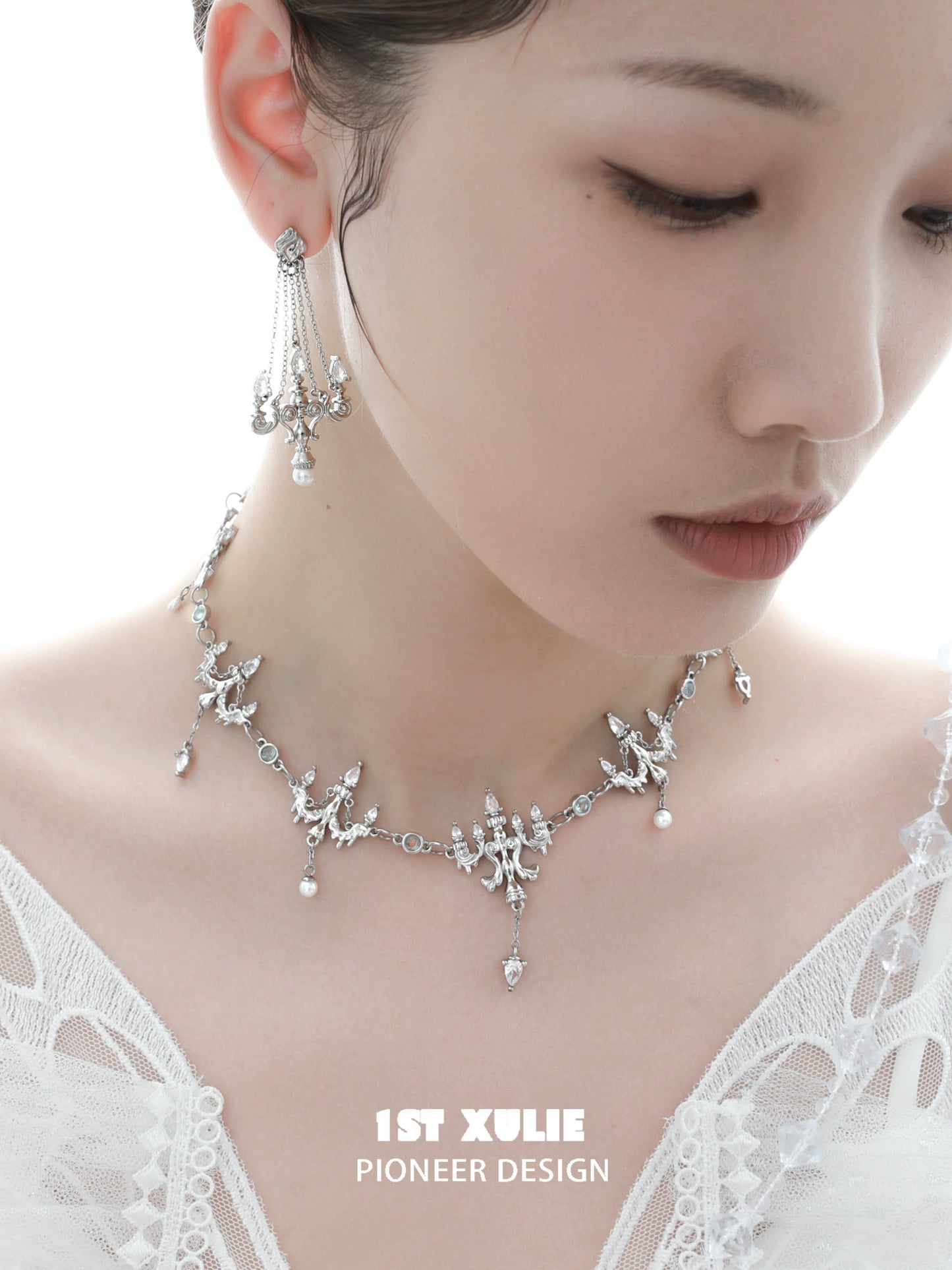 Elegant crystal lamp earrings by 1ST XULIE, paired with a matching necklace for a stunning look