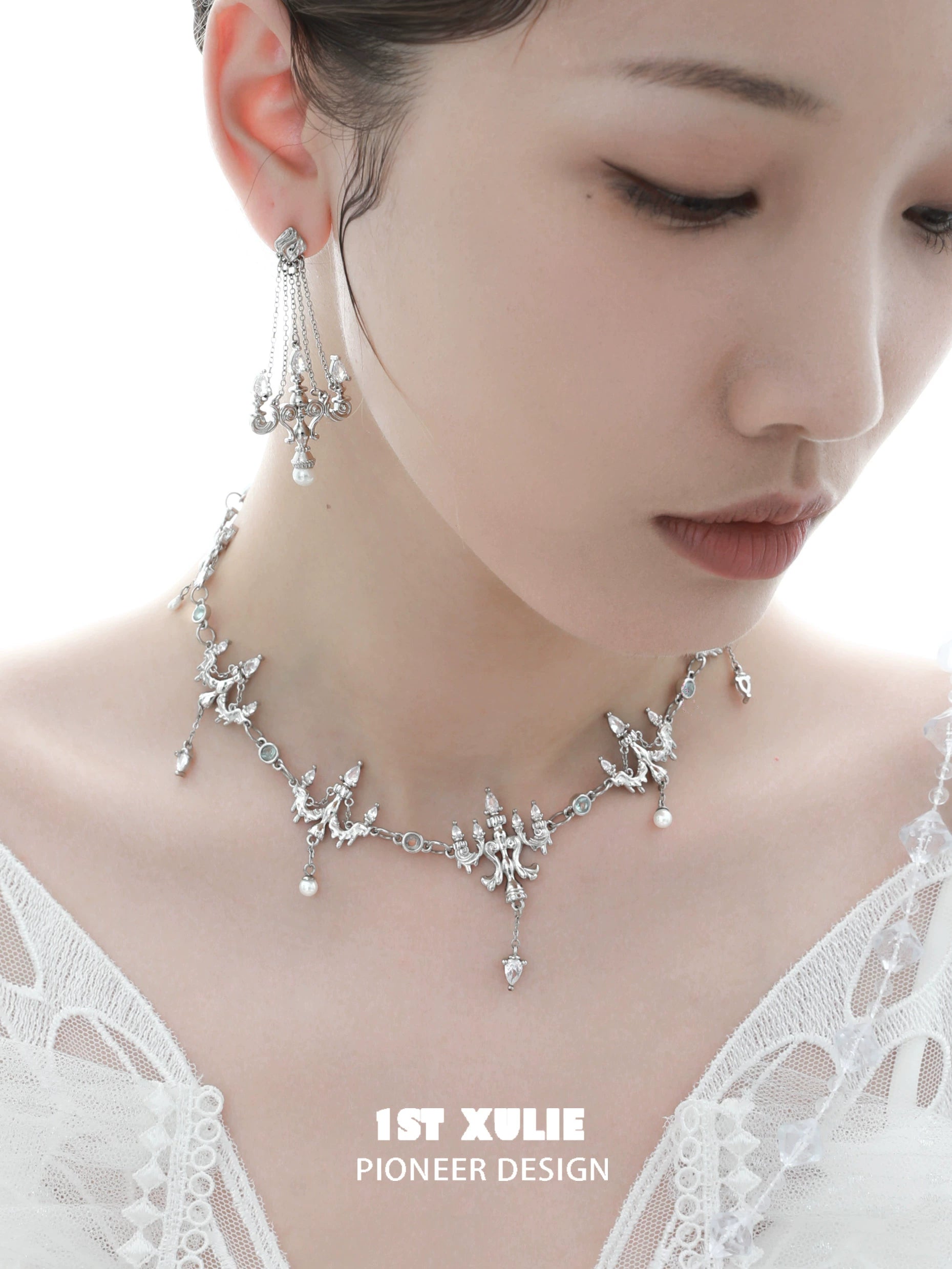 Elegant crystal lamp earrings by 1ST XULIE, paired with a matching necklace for a stunning look