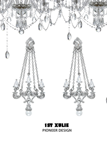 Elegant crystal lamp earrings with intricate designs and dangling chains from 1ST XULIE