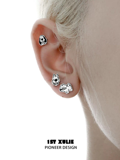 Cute puppy earrings featuring playful designs of dogs in various poses by 1STXULIE